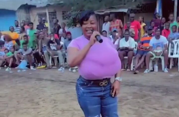 Miss Lolo walking dressed with her gigantic black tits!