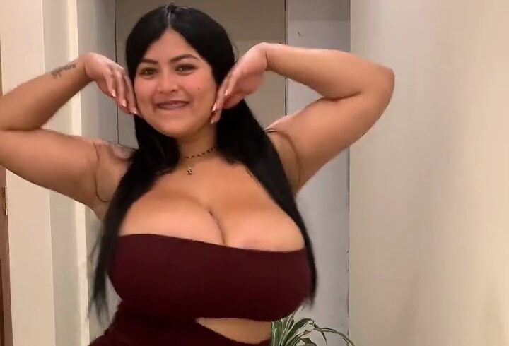 Rosario Rincon dancing in a tight dress