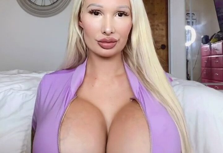 Winter Rae huge tits in purple tight dress